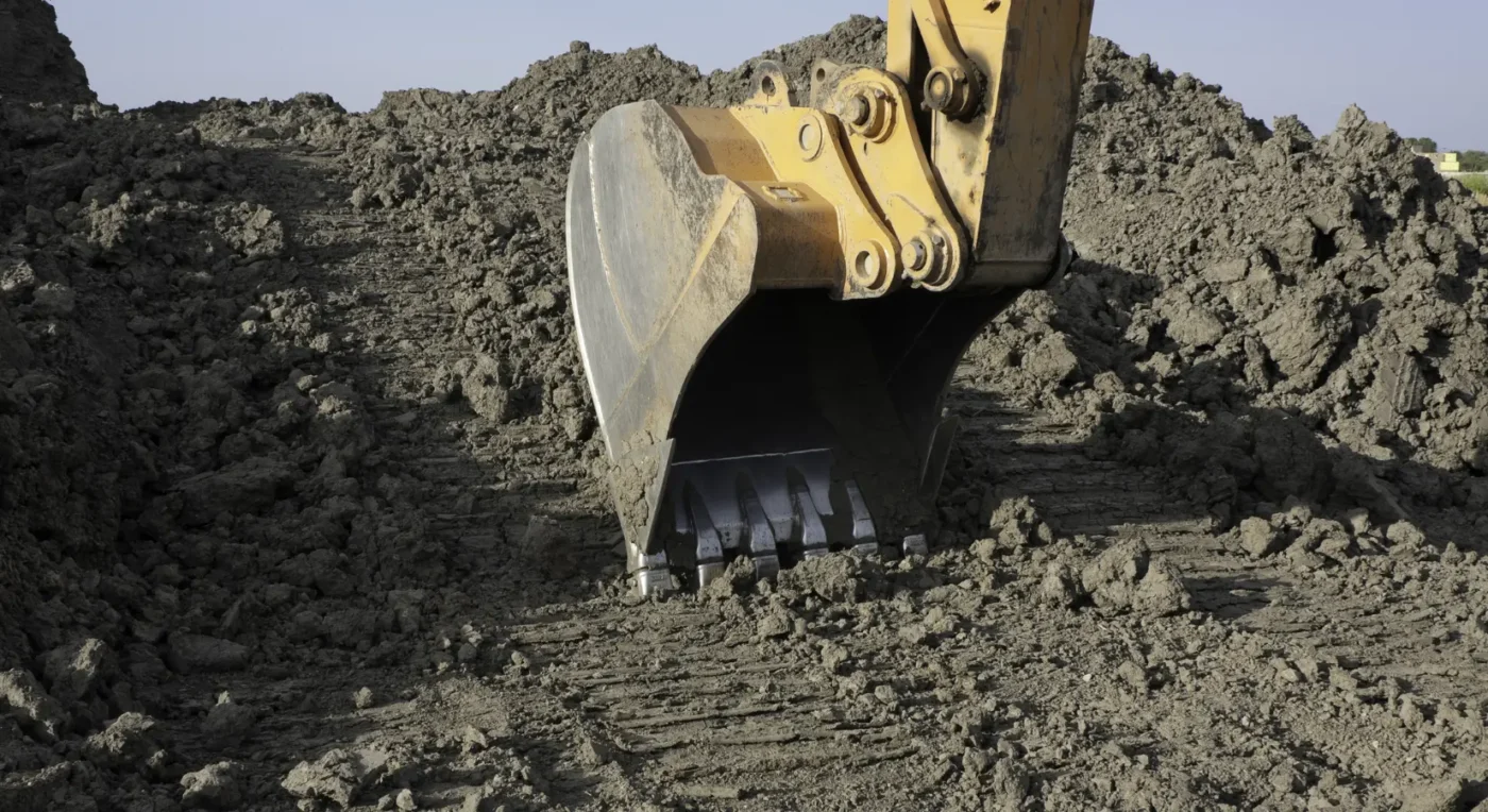 excavator digging soil