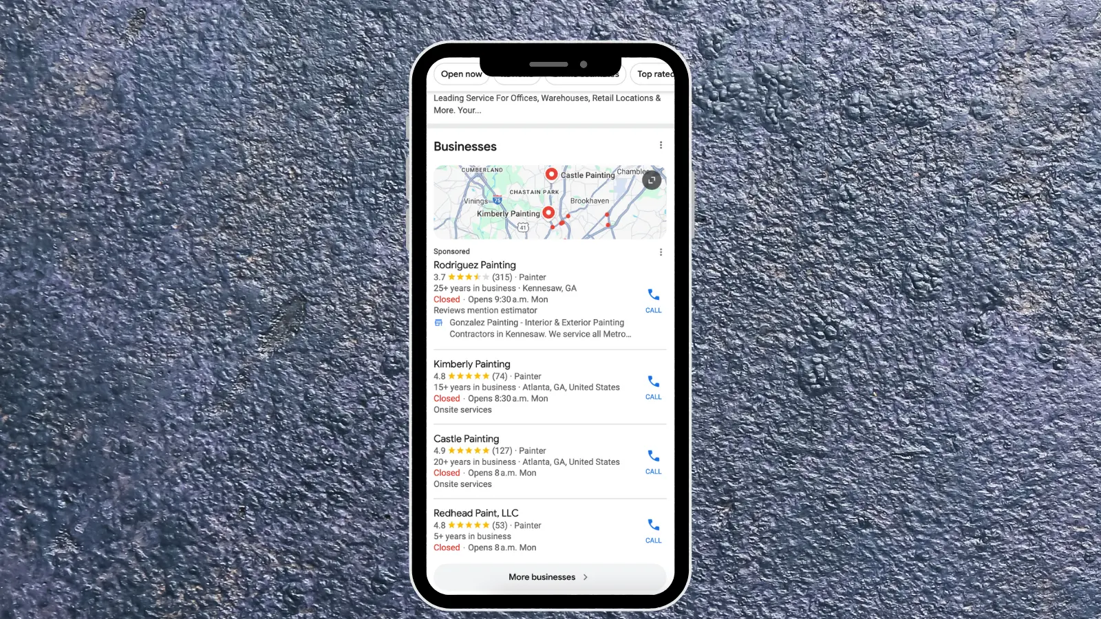 smartphone showing google search results with local painting businesses and map